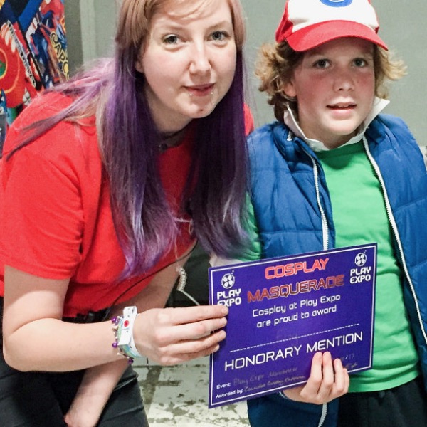 Eloy Smith Rodriguez winning a Cosplay commendation for his Ash Ketchum Pokémon outfit